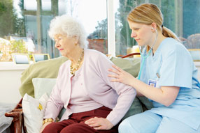 A nurse with an elderly person