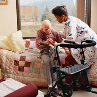 Kathy providing care to a resident